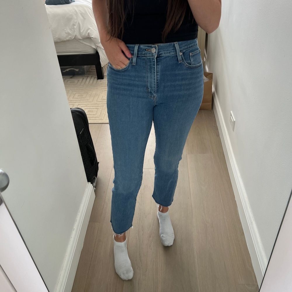 Levi high rise jeans with cut off
